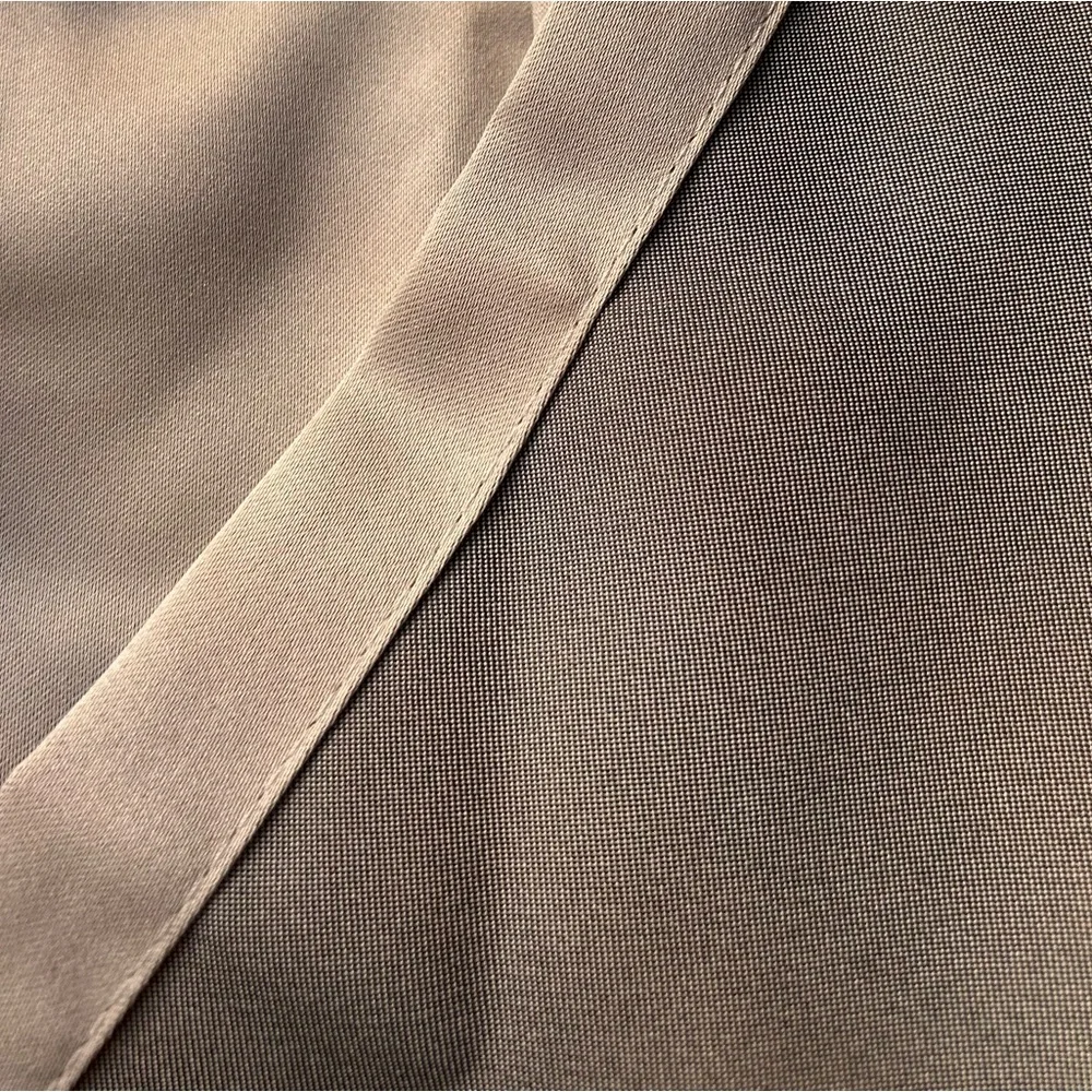 New in package 2 panels of window drapes 40x63”  2 tones gray 6 silver grommets